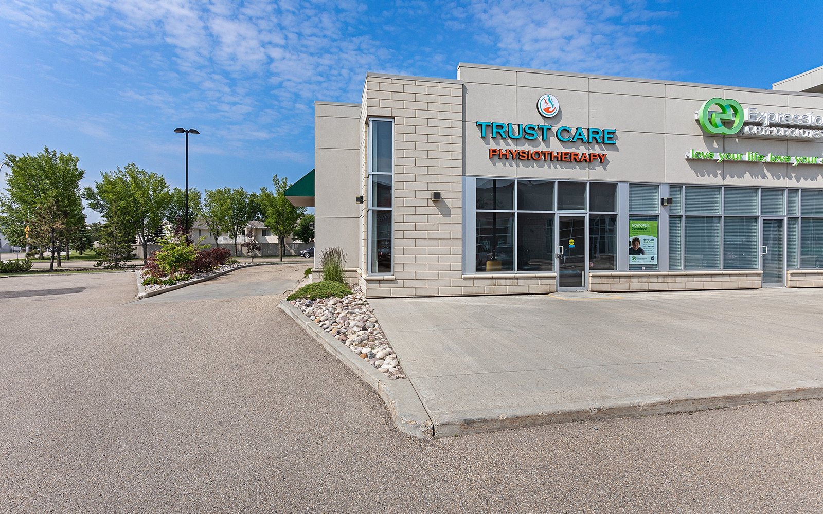 The Trust Care Physiotherapy building and signage on Miller Boulevard in north Edmonton